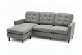A gray upholstered sectional sofa with a left-facing chaise lounge, featuring tufted back cushions, three seat cushions, and slim black legs, shown against a plain white background.