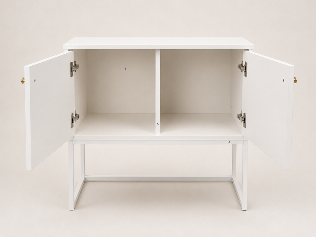 A white wooden sideboard cabinet with two doors swung open to show the interior shelving, set against a plain light beige background.