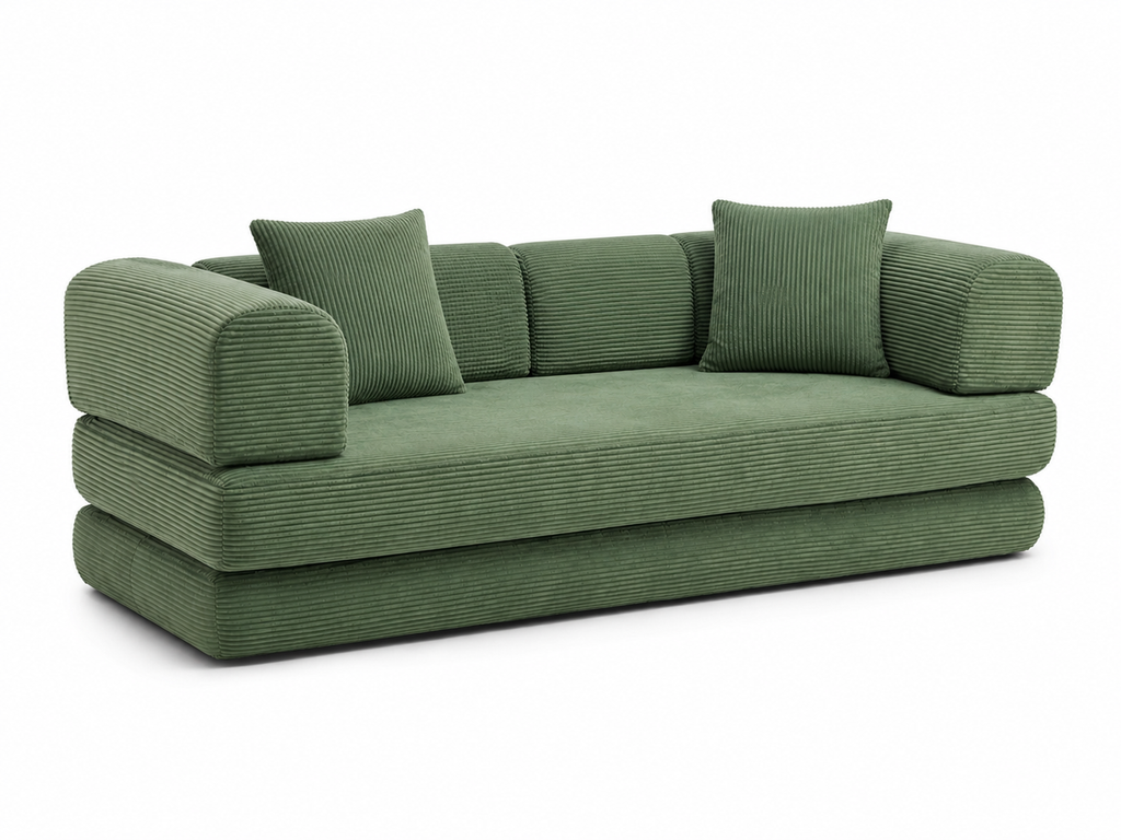 A modern green corduroy sofa with two matching square throw pillows, shown from a three-quarters angle against a plain white background.