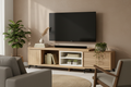 Wooden entertainment console with sliding door on a white background