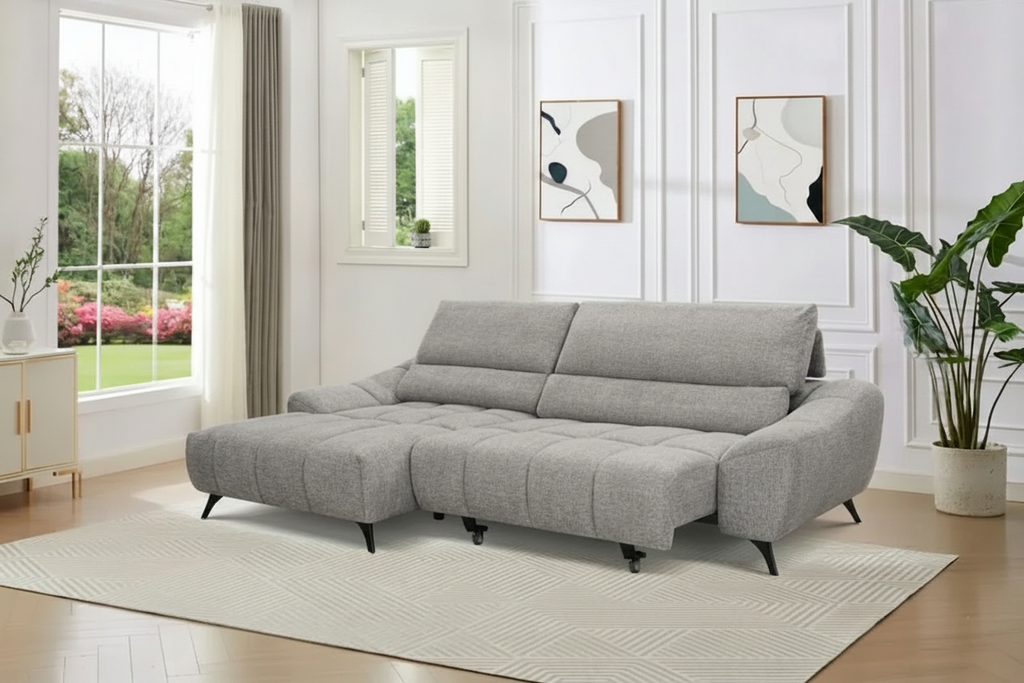 Gray sectional sofa in a living room with decor elements.