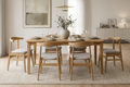 Dining room with wooden table and chairs in a modern home setting.