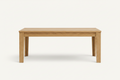 Oak dining table shown on a light gray background with dimension lines and text indicating 1800 mm length, 900 mm width, and 750 mm height. Small feature icons along the bottom mention oak finish, sturdy and durable, comfortable seats, and natural wood grain.