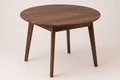 Wooden round table on a white background