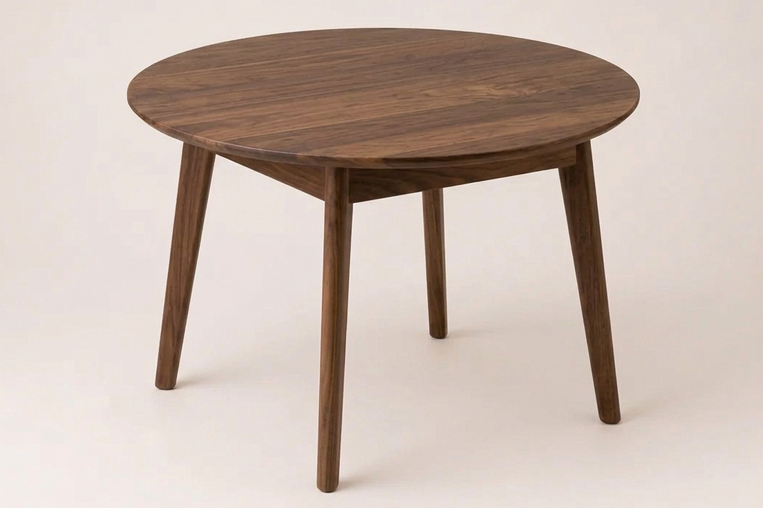 Wooden round table on a white background