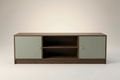 A modern media console cabinet with a dark brown wood frame and two matte sage green doors, featuring small brass knobs and an open center shelf.