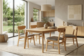 Solid wood dining table in a contemporary dining room setting
