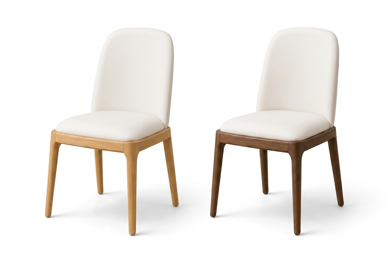 Two white cushioned chairs with wooden legs on a white background
