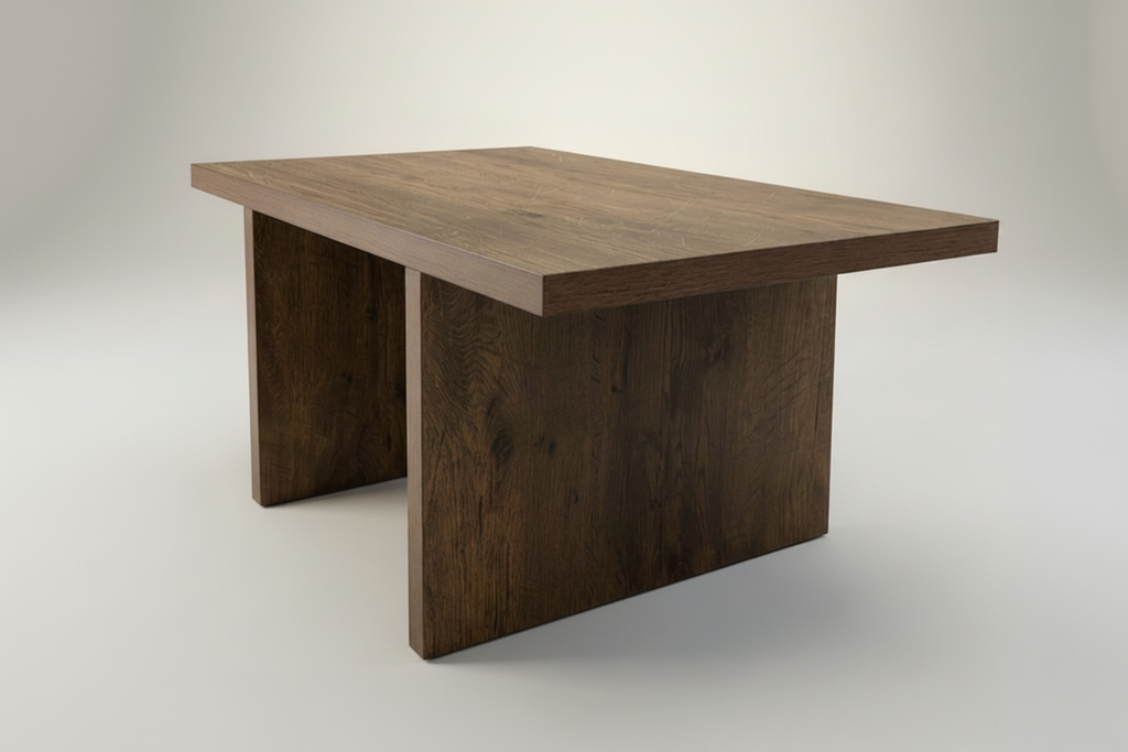 A modern rectangular wooden table with a thick, flat top and blocky pedestal legs, shown on a neutral light gray background.