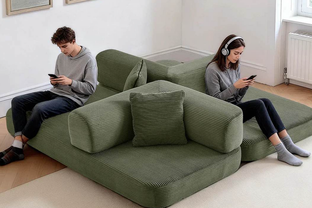 An olive green modular sectional sofa shown in a home interior with two people sitting on it, plus four smaller sofa configuration thumbnails along the bottom indicating different forms.